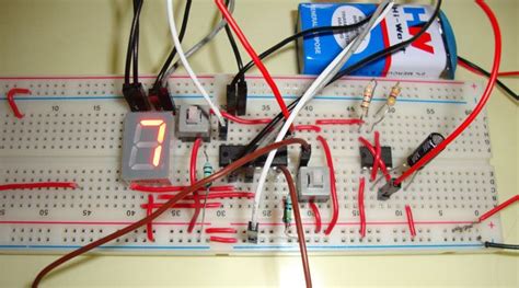 I want the circuit diagram for digital counter using sensor. Reaction Timer Game using IC 555 and IC 4026