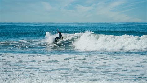 Man Surfing On Sea Waves Hd Wallpaper Peakpx