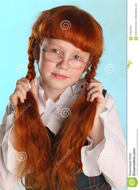Portrait Of Attractive Redhead Young Schoolgirl With