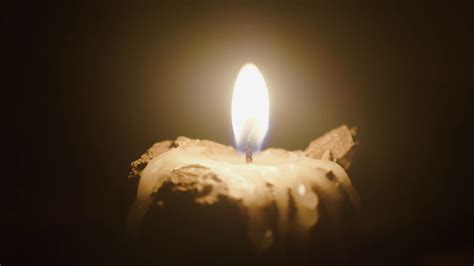 Burning Candle In Candlestick On Table In Stock Footage Sbv 335174224