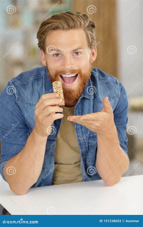 Man Showing Cereal Bar He Going To Eat Stock Image Image Of Open Adult 151238603