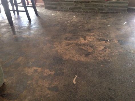 Putting fresh paint on an old concrete floor can cover more stains. My living room has a concrete floor, help me with cheap ...