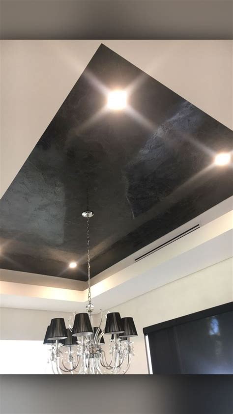 Peel apart from paper backing and apply directly to the affected area. Black Venetian plaster on the ceiling, modern design ...