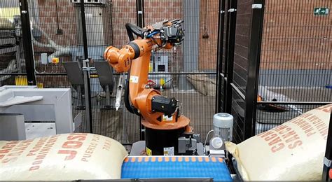 Kuka Robot Performs Quality Checks On Coffee Bags Kuka Ag