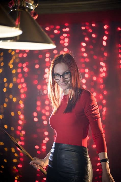 Billiard Club A Woman With In Glasses With Red Hair And Nice Figure Standing By The Table