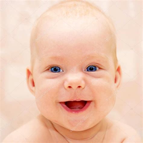 Baby With Bright Blue Eyes Stock Photo By ©vitalinka 14710407