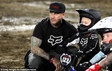 Pink and her husband Carey Hart cheer on their son Jameson Hart at a ...