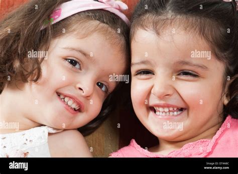 Happy Twins Smiling Stock Photo Alamy