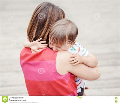 Woman Mother Comforting Her Crying Little Toddler Boy Son