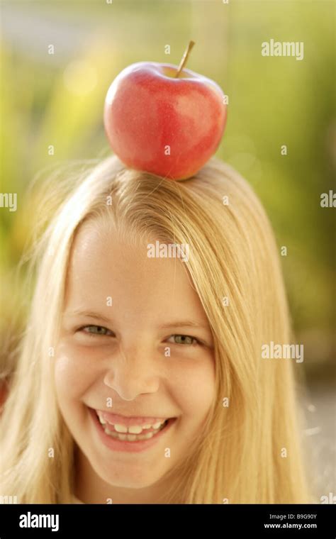 Girl Apple Head Balances Smiling Portrait Series People Child Blond