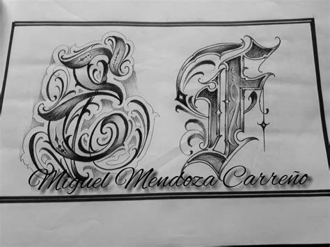 Some Type Of Lettering That Is Drawn On Paper