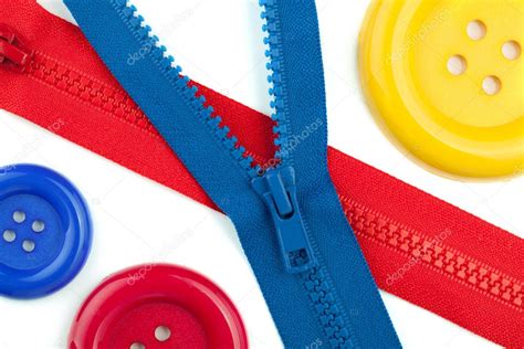 Three Colored Sewing Buttons And Two Zippers Closeup ⬇ Stock Photo