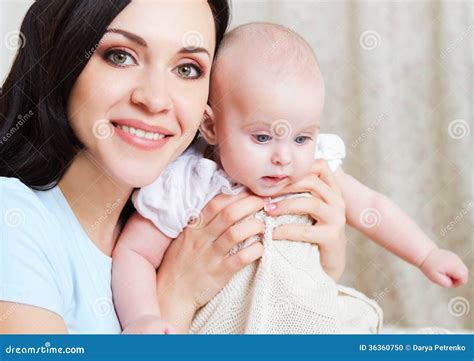Happy Smiling Mother With Six Month Old Baby Girl Stock Photo Image