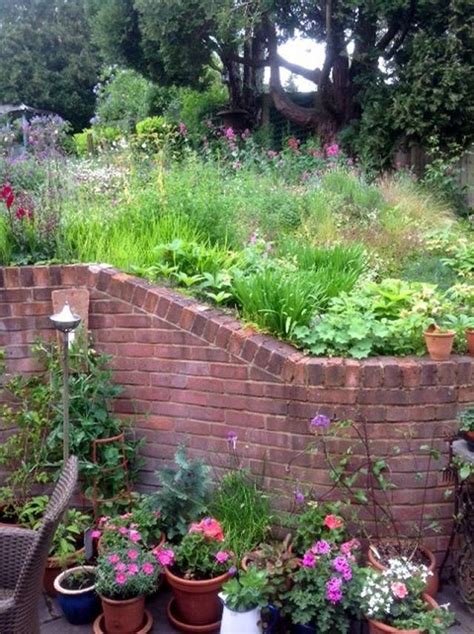 Gardening In England Sloped Garden Garden Design Garden