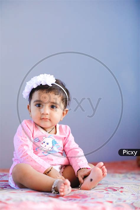 Image Of Cute Indian Baby Girl With Cute Expression On Face Fg934759 Picxy