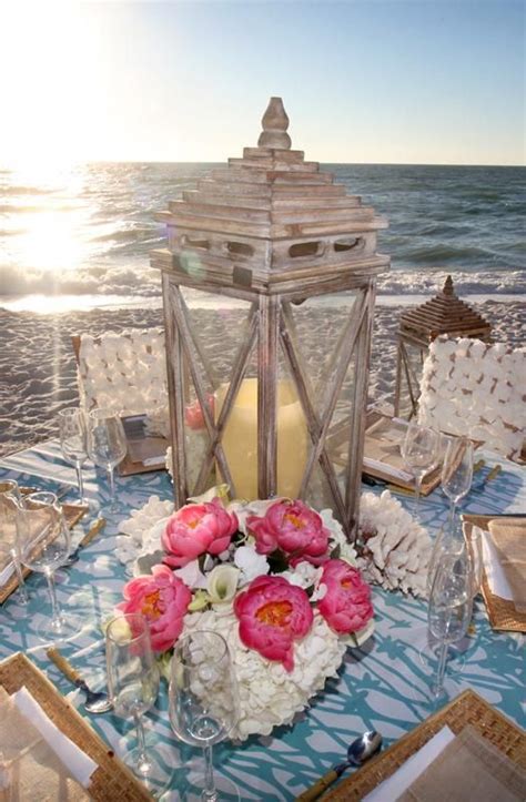 For a romantic beach wedding idea, wait for the sun to start sinking in the sky and snap a romantic shadow shot like this one photographed by imaging by susanne. Best Florida Wedding Venues | Beach wedding centerpieces ...