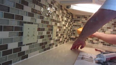 Installing backsplash tiling in your kitchen is also a good diy project for homeowners looking to get their hands dirty and learn new skills around the house. How to install glass mosaic tile backsplash, Part 3 grouting the tile - YouTube