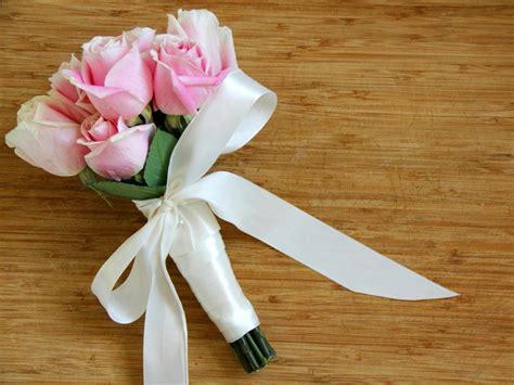 Different coloured construction paper is it'll feel more special if you make an effort to associate the decoration with the occasion the flowers are being presented. Use Silk Ribbon to Create a Wedding Bouquet | how-tos | DIY
