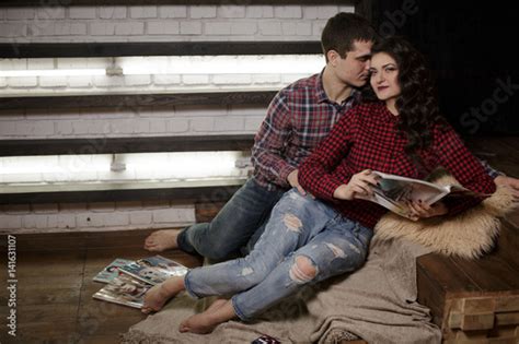 Man And Woman On The Bed Man And Woman Hugging Lay On The Floor With