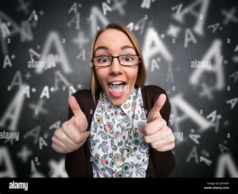 Happy Nerd Girl Showing Thumbs Up With A Grades On Background Stock