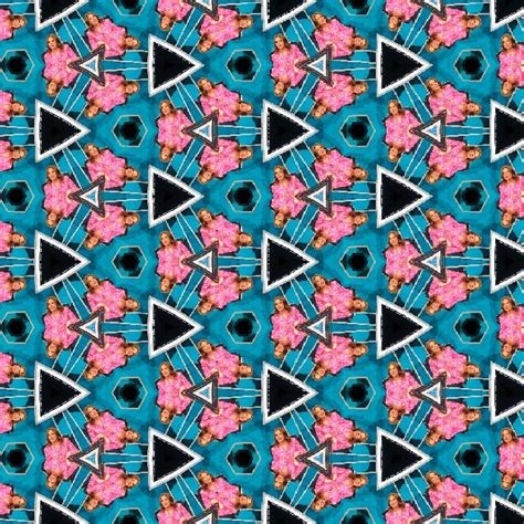 A Blue And Pink Pattern With Flowers On It