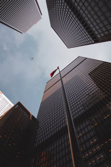 Low Angle Photography Of Tall Building Buildings · Free Stock Photo