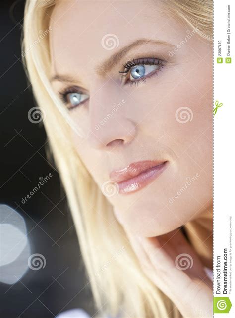 Portrait Of Beautiful Blond Woman With Blue Eyes Stock