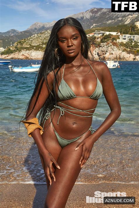 Duckie Thot Sexy Poses Flaunting Her Hot Bikini Body In A Photoshoot