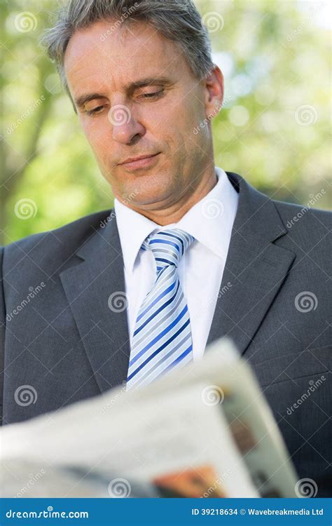 Businessman Reading Newspaper Stock Photo Image Of Head Male 39218634