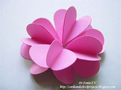 Because this punch is not symetrical, we cut out a heart on either side. Cards ,Crafts ,Kids Projects: Heart Punch 3 D Flower Tutorial