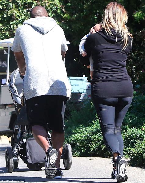 Kim Kardashian Showers Babe North With Love While Kanye West Pushes The Stroller On Family