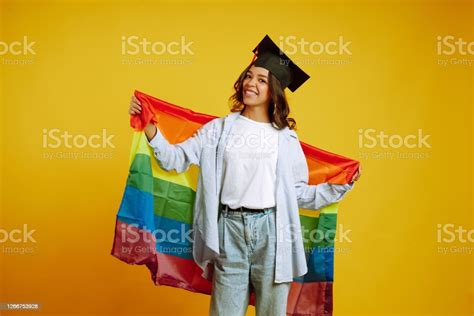 Young Curly Hair Woman Stand With Lgbt Pride Flag Stock Photo