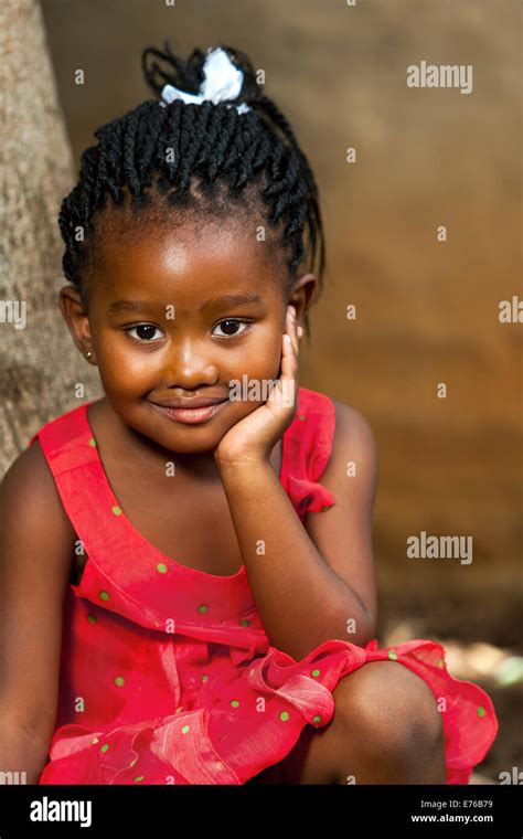 Close Up Facial Portrait Of Cute African Girl Outdoors Stock Photo Alamy