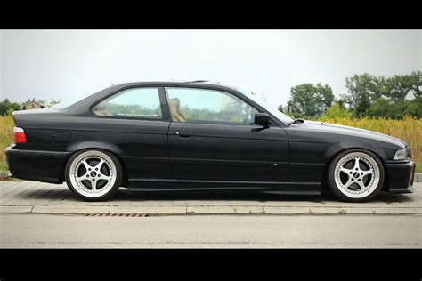 Black Bmw E36 Coupe Sitting On Some Cult Classic Oz Mito Ii Wheels