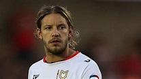 MK Dons forward Alan Smith says he is unlikely to make the move into ...