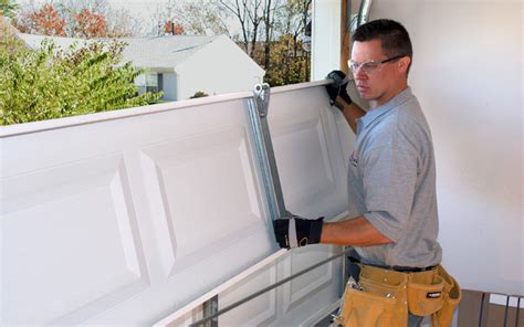 Working inside the garage with the garage door closed, examine the tracks for dents, crimps, or flat spots. How to Choose a Garage Door Repair Company - Cressy Door ...