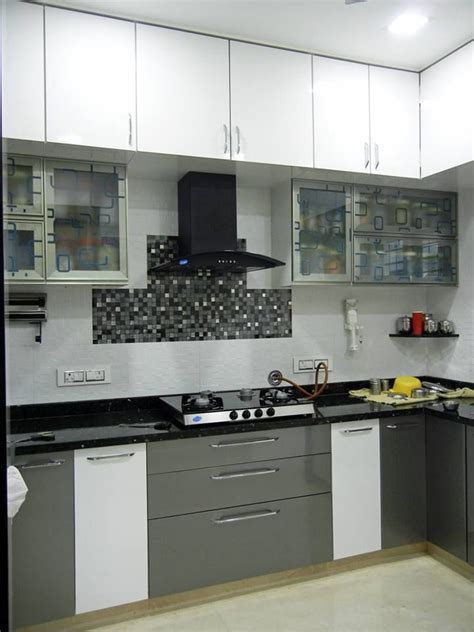 We offers best kitchen design & interior design service pune, waked, pimple saudagar, baner. 3bhk apartment interiors by suniti modern kitchen | homify ...