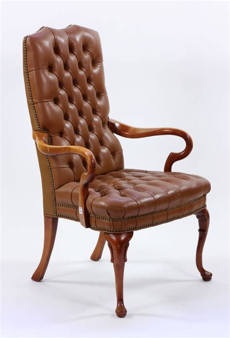 Saw something that caught your attention? Lot Detail - Chesterfield Style Leather Armchair