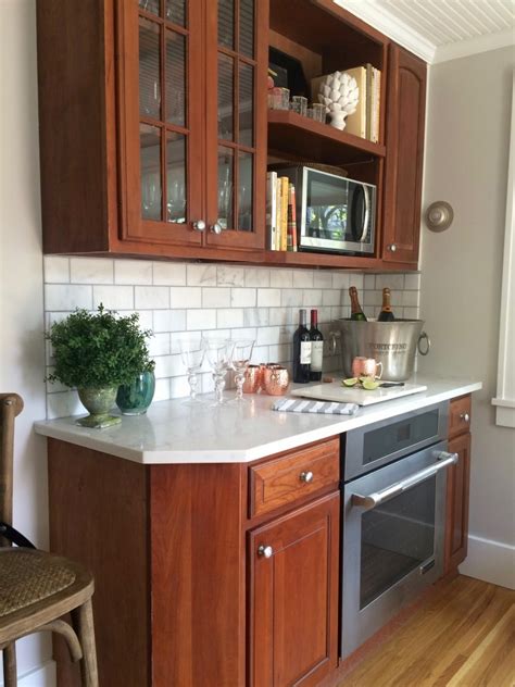 Cabinets over the sink are different than the standard height of cabinets above a refrigerator or the oven, for instance. Rustic Farmhouse Kitchen Remodel: Tearing down the wall