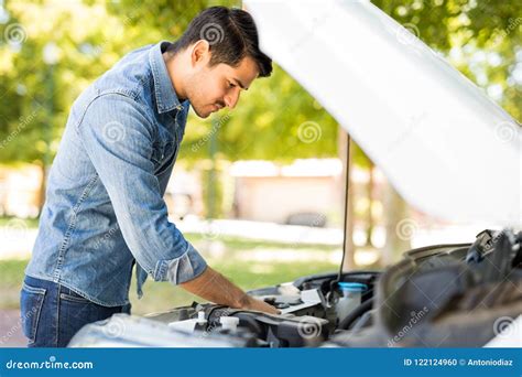 Man Trying To Repair His Car Stock Photo Image Of Transportation