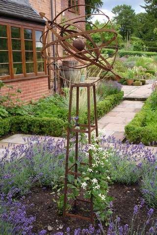 Garden obelisk & plant support provides support for a range of plants, climbers & vegetables. 48" metal armillary garden sphere statue - Google Search ...