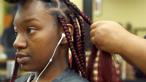 Getting braids has long been a rite of passage for little girls and sometimes boys. Has black hair braiding licensing gone too far? - YouTube