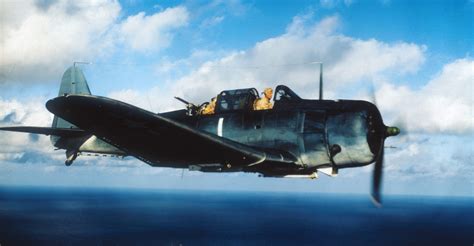 Men Working Around Plane On Ship Deck World War Ii