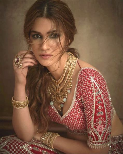Kriti Sanon Is Beguiling Beauty In A Red Embellished Lehenga For Peacock Magazine