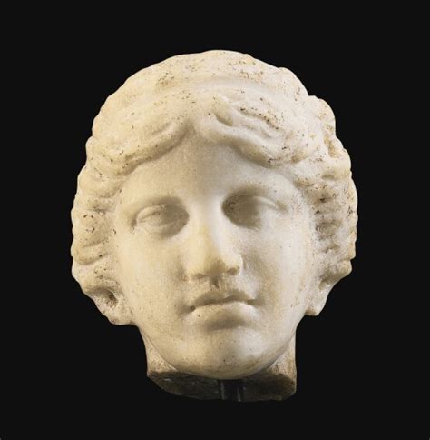 37 A Roman Marble Head Of Apollo Circa 1st Century Ad