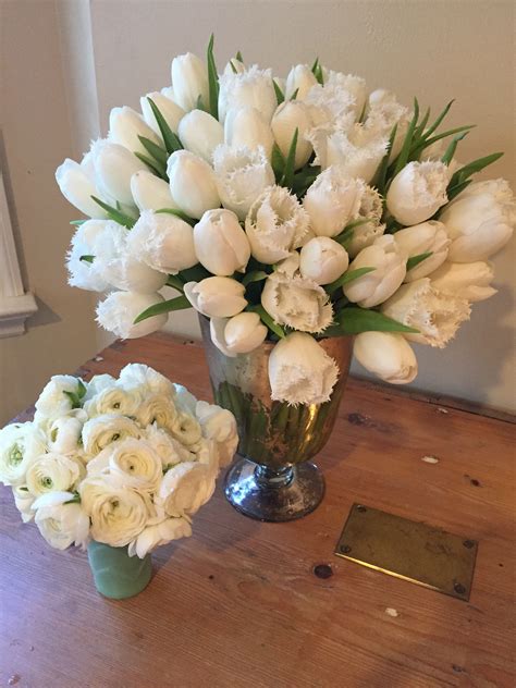 Elegant And Simple Centerpiece Of White Tulips And White