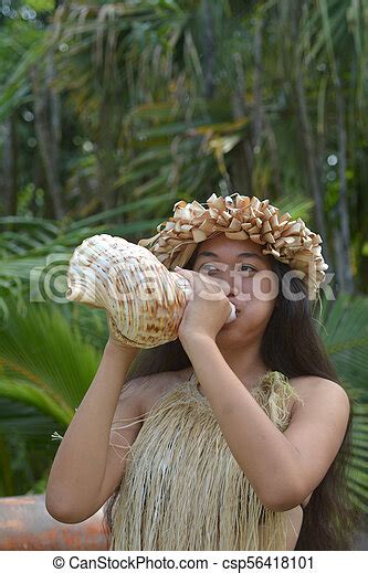 polynesian cook islander woman blowing conch shell in rarotonga cook islands polynesian cook