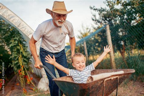 Happy Grandfather And His Grandson Having Fun Together Stock 写真 Adobe