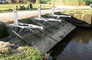 Since water is very heavy, it exits the base of a dam with the enormous force of water pushing from above. Floodgate management