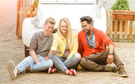 Happy Multiracial Best Friends Having Fun Using Mobile Phone Stock Image Image Of Outdoors